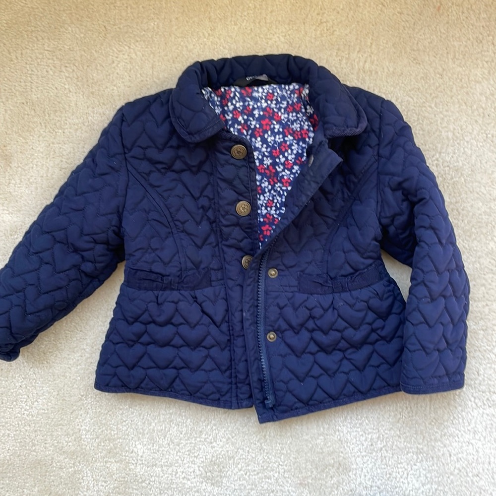 Quilted girls navy jacket with floral lining